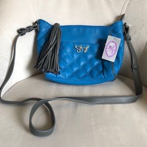 Blue Sharif bag with tags